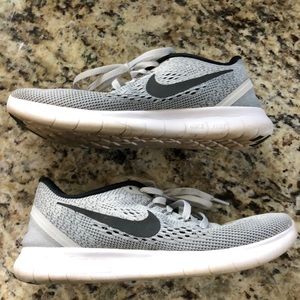 Size 7.5 Nike Free Runs. Great condition!